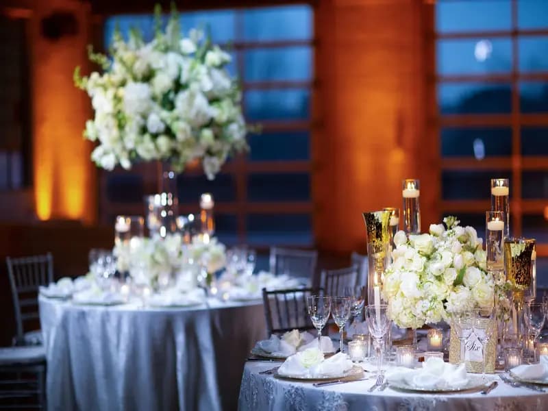 Wedding reception dance floor with custom uplighting and DJ setup at a waterfront Connecticut venue